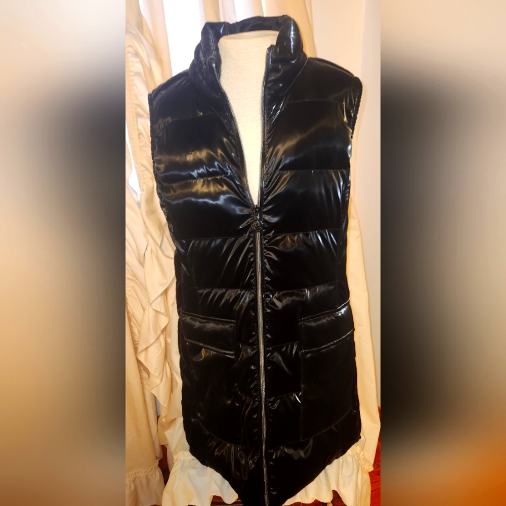 Stylish puffer fitted vest. Dolcezza